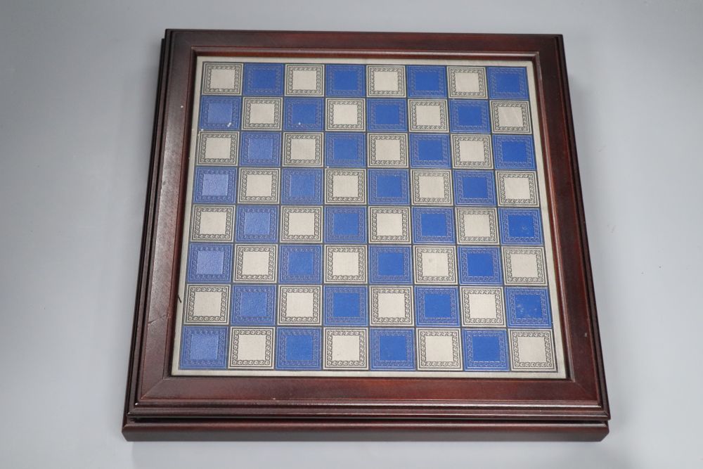 A boxed Battle of Waterloo chess set, with board to lid of box